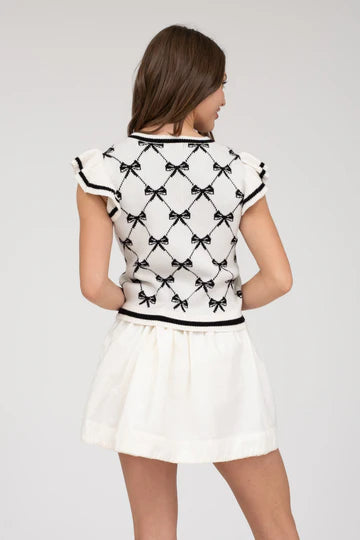 BOW PATTERN RUFFLE SWEATER