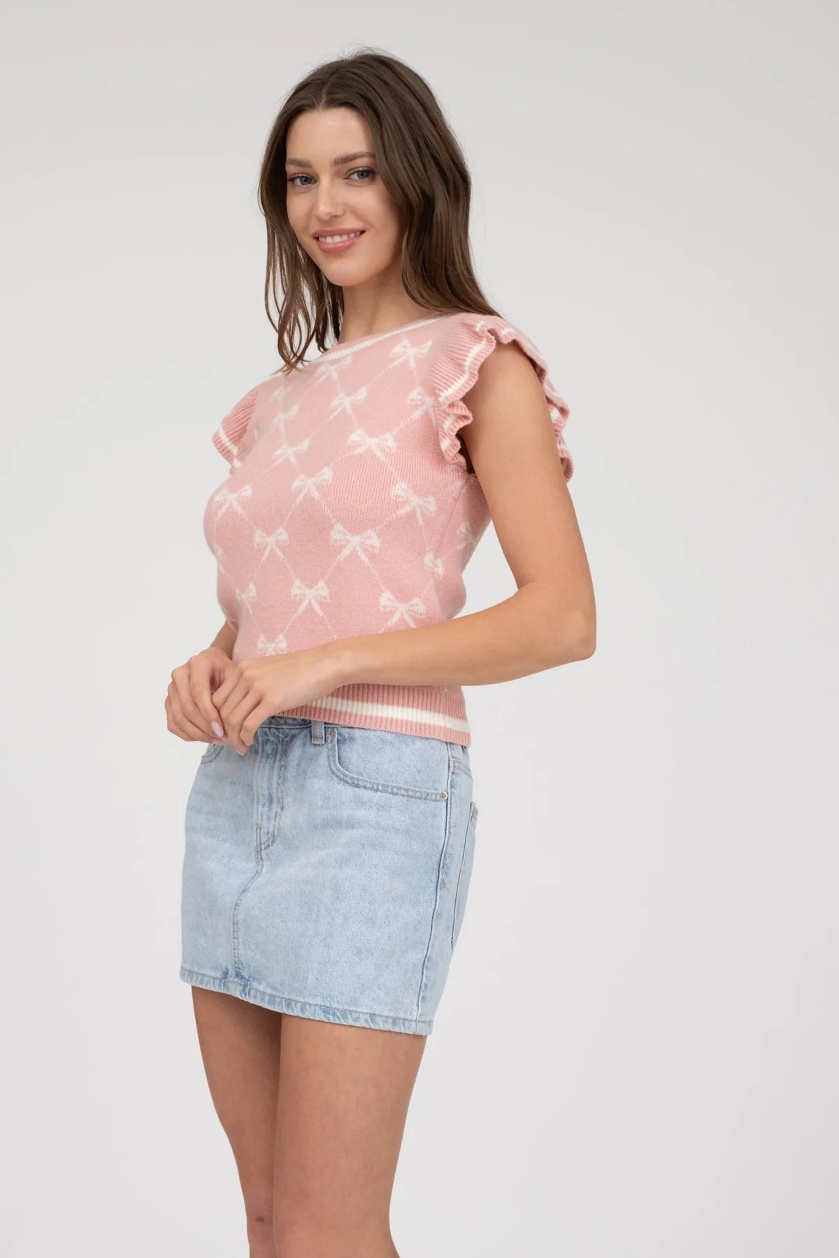 BOW PATTERN RUFFLE SWEATER